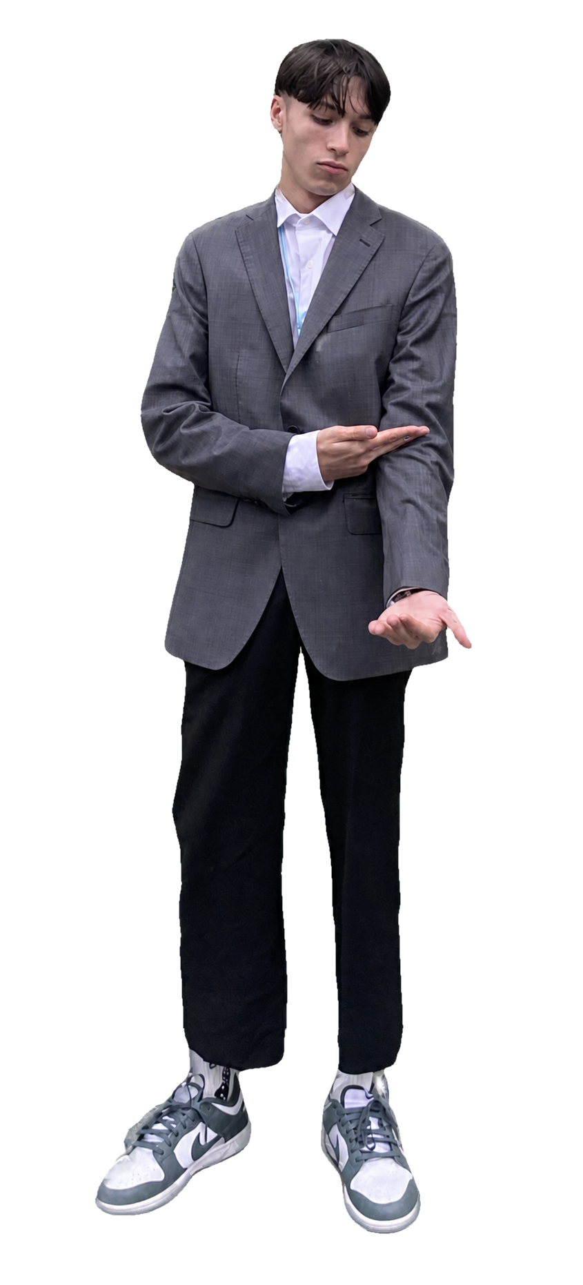 Jed Brown standing in a gray suit